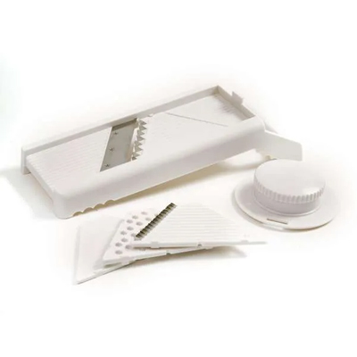 NORPRO<sup>&reg;</sup> Mandoline Slicer - NORPRO<sup>&reg;</sup> Mandoline Slicer - Easily slice, grate or shred fruits, vegetables or meat. Includes 4 attachments with stainless steel blades as well as a safety guard. Measures: 4″ x 12″ x 4.25″ / 10cm x 30.5cm x 11cm